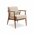 Light beige fabric armchair with wooden frame suitable for modern living spaces